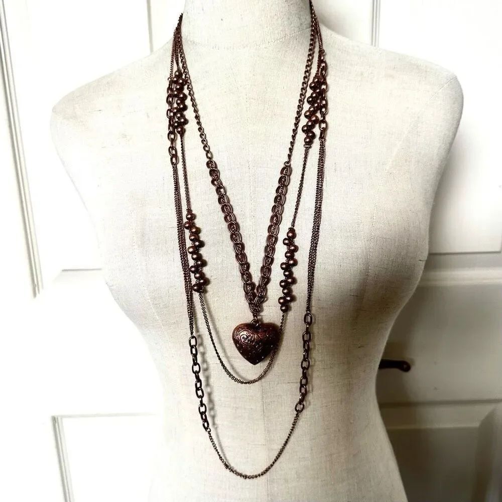 Cookie Lee wear several ways heart pendant multi chain necklace